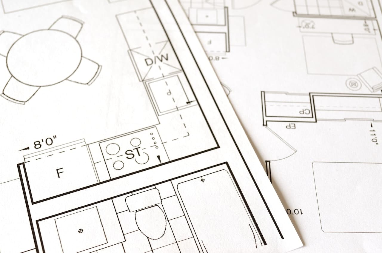 Architectural plans and blueprints laid out for a project